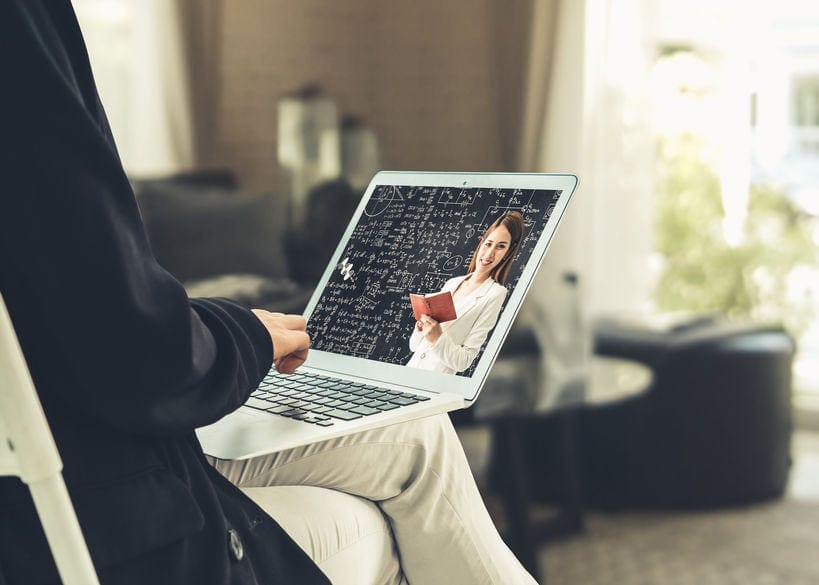 student using e-learning application on laptop