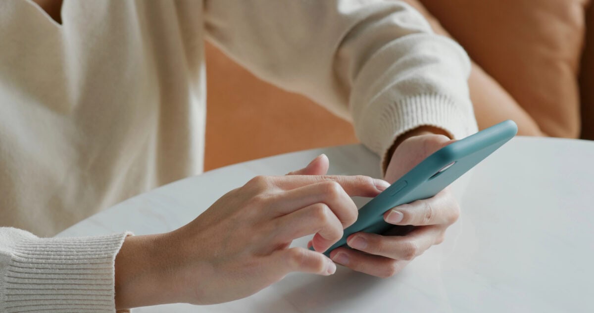 Woman use of smart phone at home