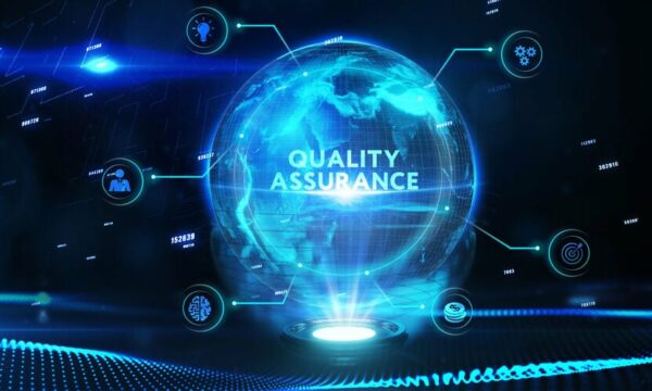 A blue illuminated globe with the words "Quality Assurance" on it