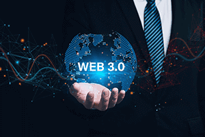 Man in suit holding globe that reads Web 3.0